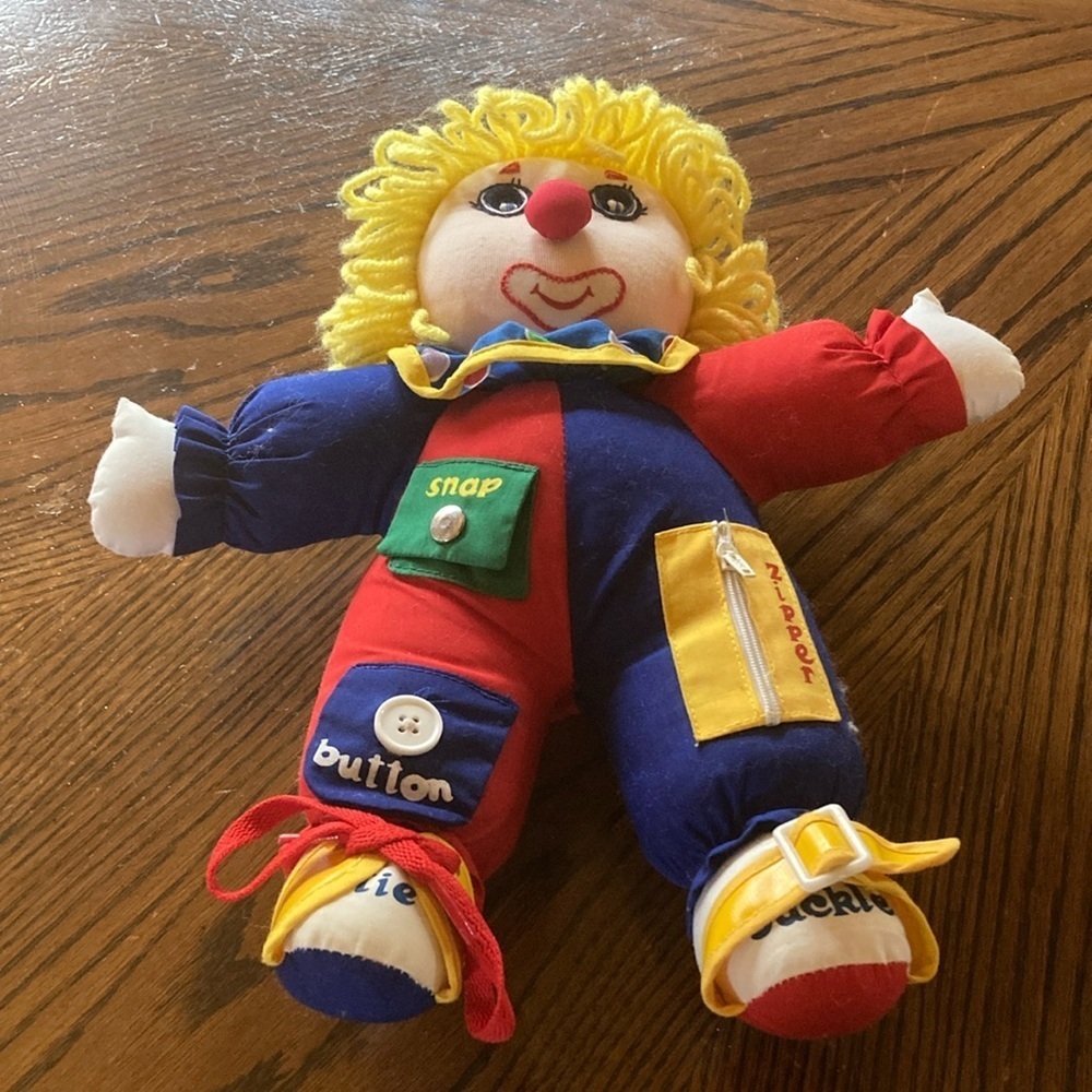 90’s learn and play clown plush primary colors